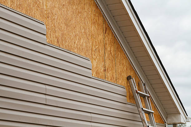 Professional Siding Contractor technician working in Natrona Heights, PA